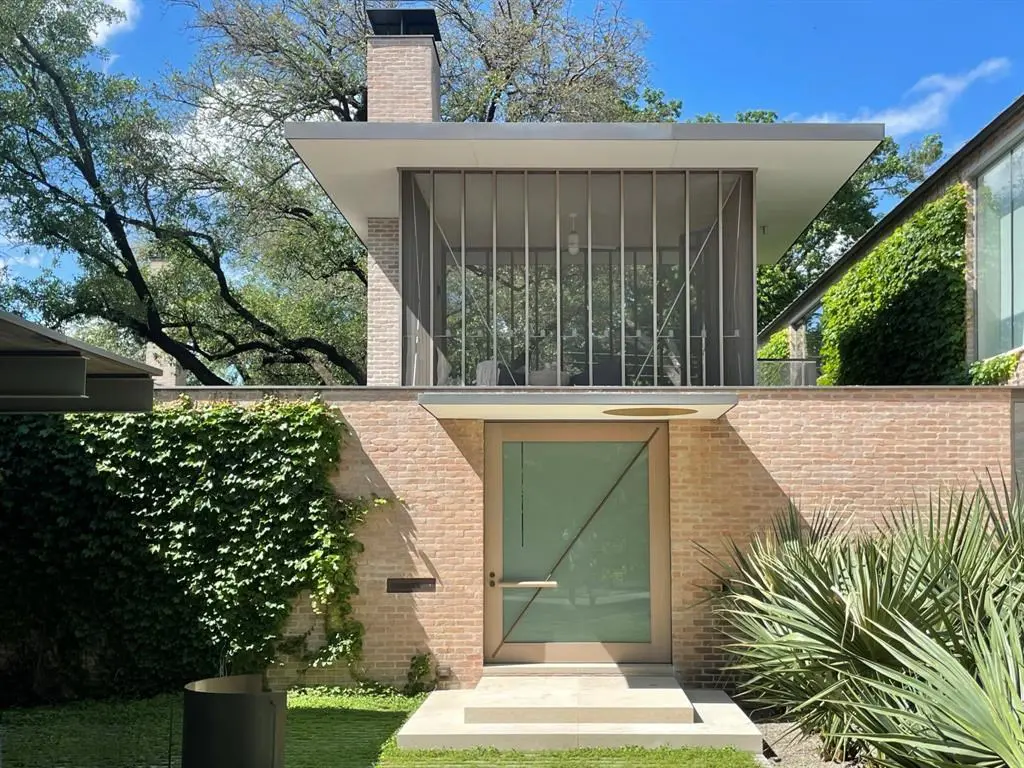 Designed by esteemed Texas architect Max Levy, 5543 Drane Drive in Greenway Parks strikes an elegant balance.