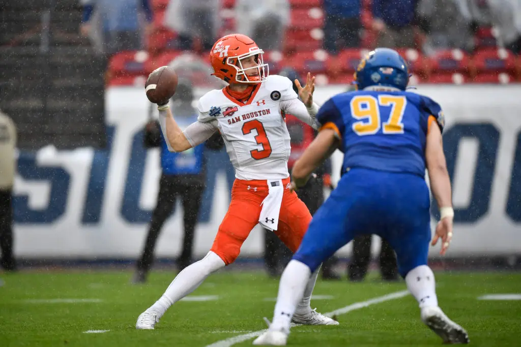 Eric Schmid threw in the rain, sacrificed his body on the ground and always stayed calm to drive Sam Houston State to its first national championship. (Photo by Andy Hancock/NCAA Photos via Getty Images)