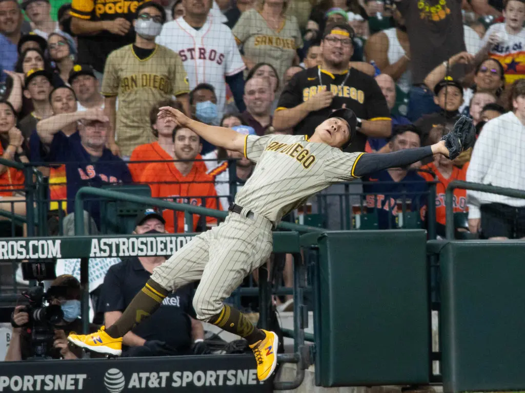 Former KBO star Ha-Seong Kim went all out to snag this baseball. Photo by F. Carter Smith)