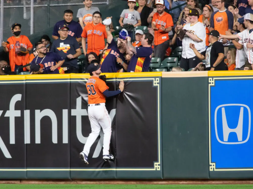 Kyle Tucker could only watch this ball just go over the wall. (Photo by F. Carter Smith)