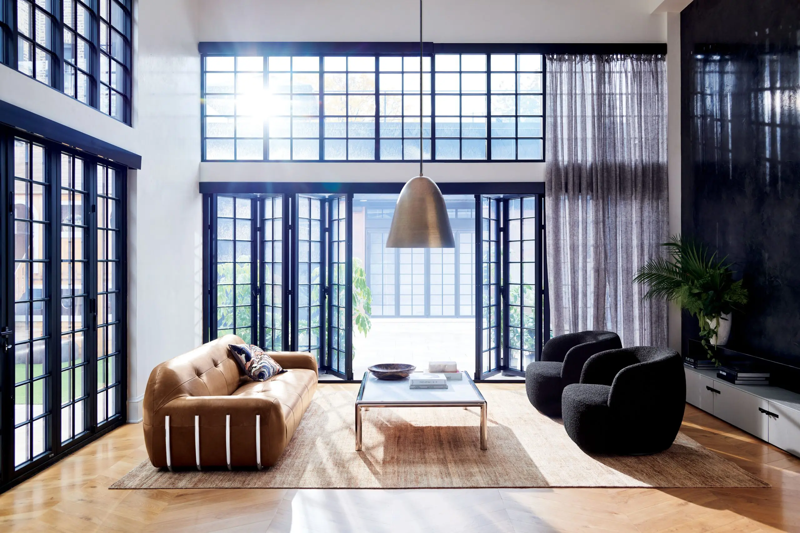 CB2 Brace sofa and Gwyneth chairs