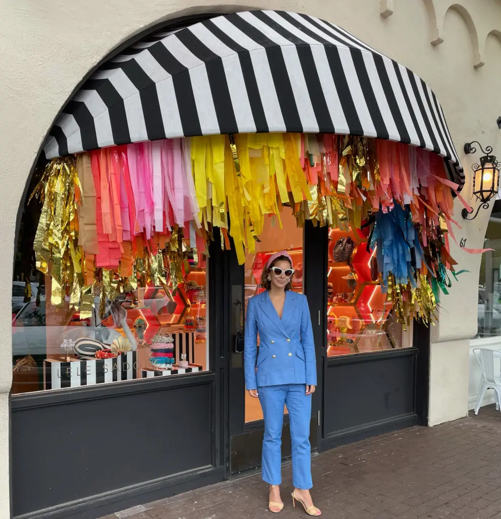 Dallas native and designer Lele Sadoughi outside her first brick-and-mortar boutique in Highland Park Village. (Photo by Highland Park Village)