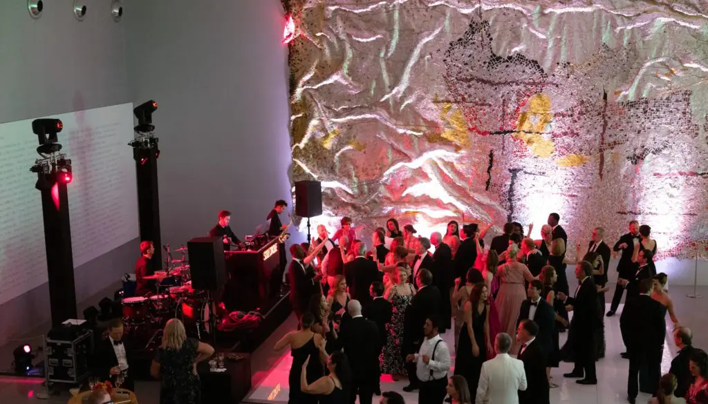 Dancing on the lower level of the Museum of Fine Arts, Houston's Nancy and Rich Kinder building closed out the May 2021 Grand Gala Ball. These balls are golden in their short programming. (Photo by Daniel Ortiz)