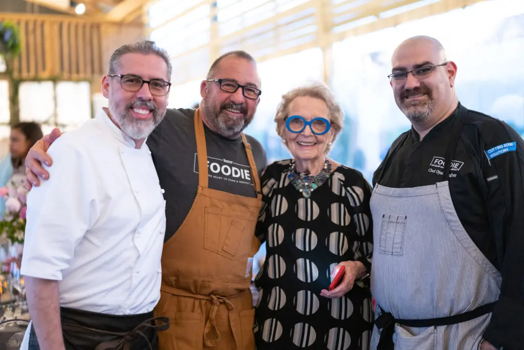 Honoree Peg Lee with the Sysco team in The Gathering Barn at Hope Farms where Recipe For Success hosted the Delicious Alchemy dinner. (Photo by Kirsten Gilliam)