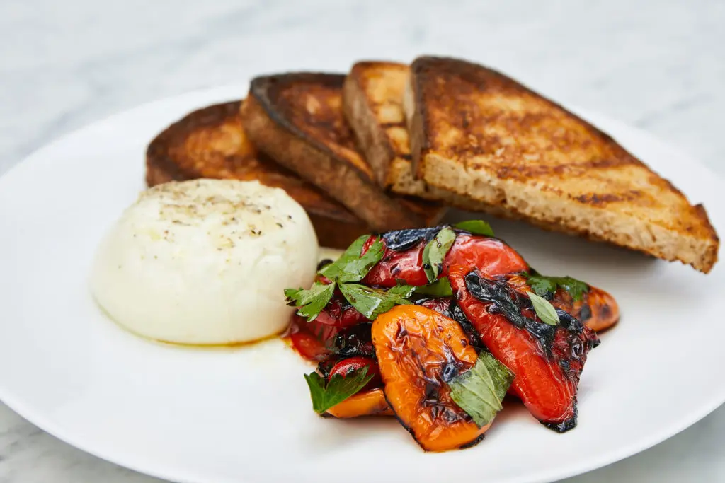 Burrata with roasted peppers at RH's Rooftop Restaurant and Park. (Photo by R2ro Photography)