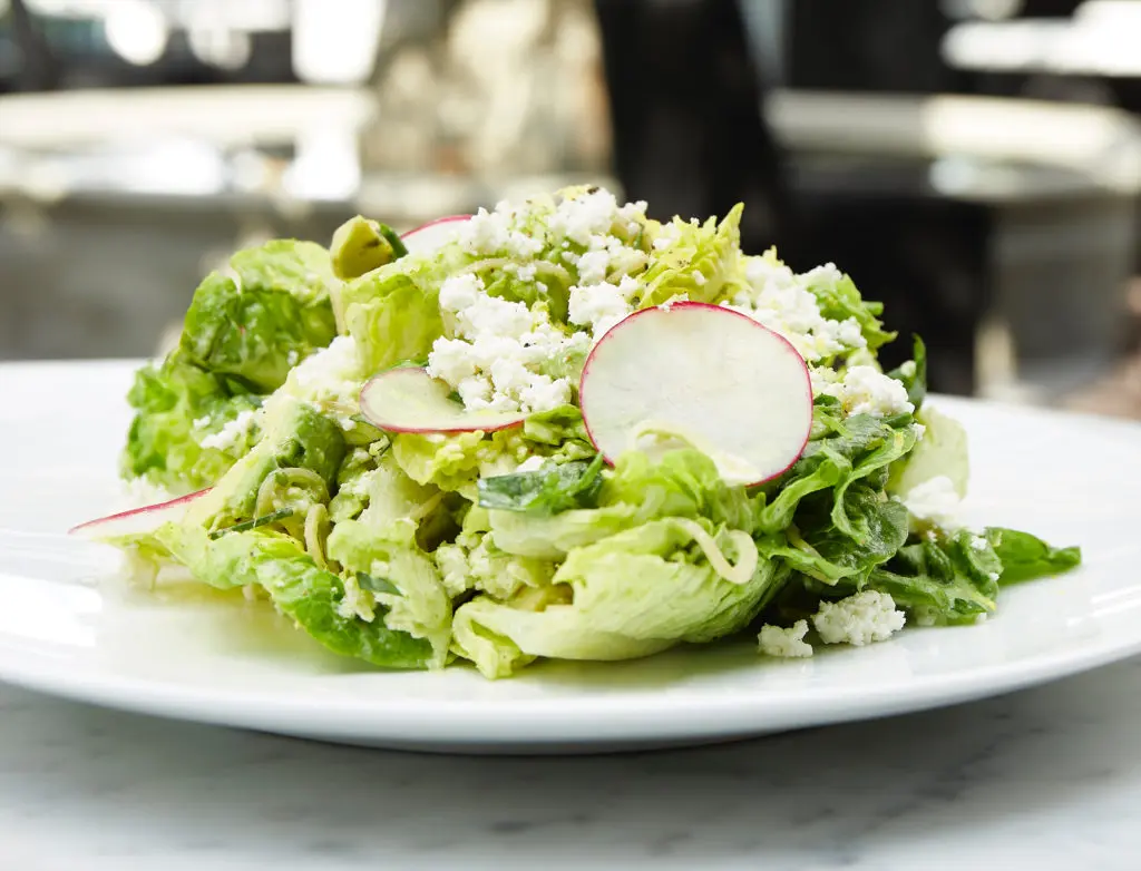 Start with the Gem Lettuce salad with feta and avocado at RH Rooftop Restaurant. (Photo by R2ro Photography)
