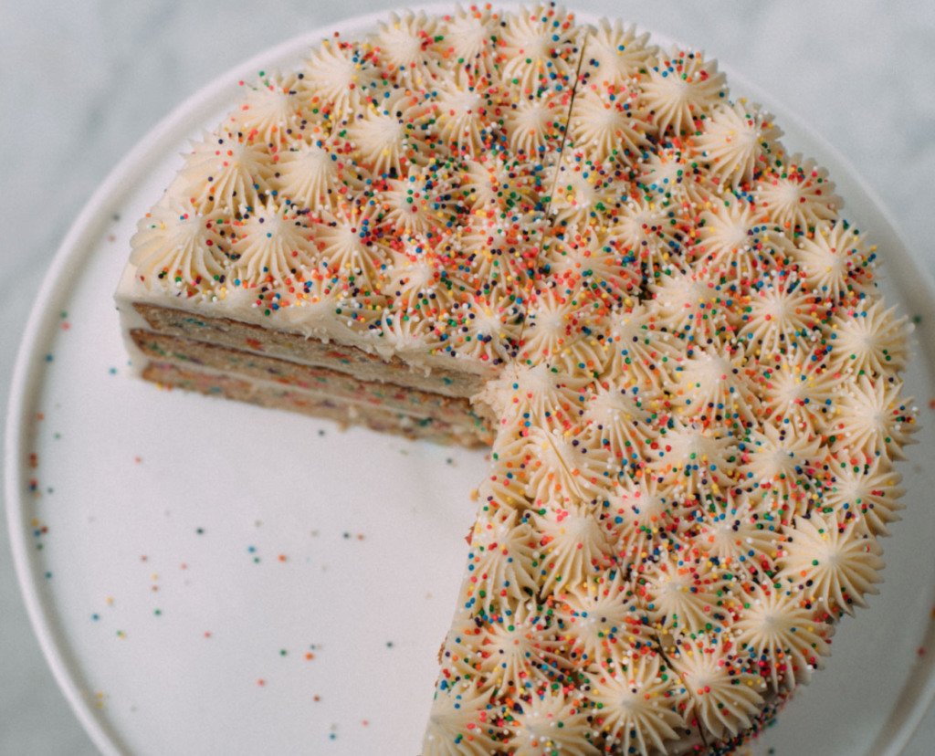Sweet bakers make cakes daily in multiple flavors and styles.