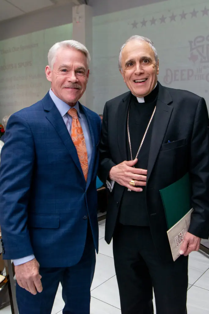 Emcee Tom Koch and honorary chair Cardinal Daniel DiNardo at the annual Catholic Charities luncheon at Life HTX. (Photo by Michelle Watson (CatchLightGroup.com))