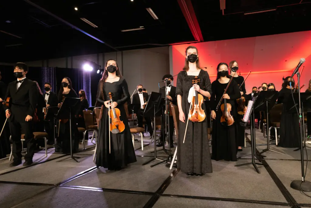 The Virtuosi Chamber Orchestra taking bows at the 25th anniversary gala, held at the Hyatt Regency Hotel Downtown. (Photo by Daniel Ortiz)