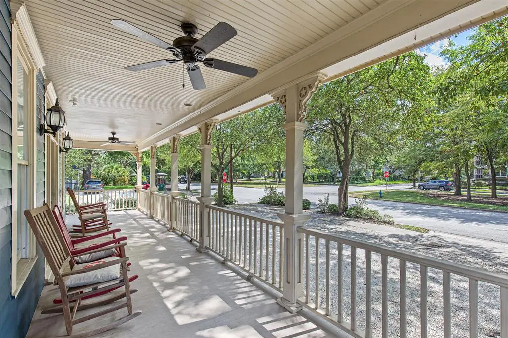 The wrap-around porch at the Serca Wines tasting room in The Heights.