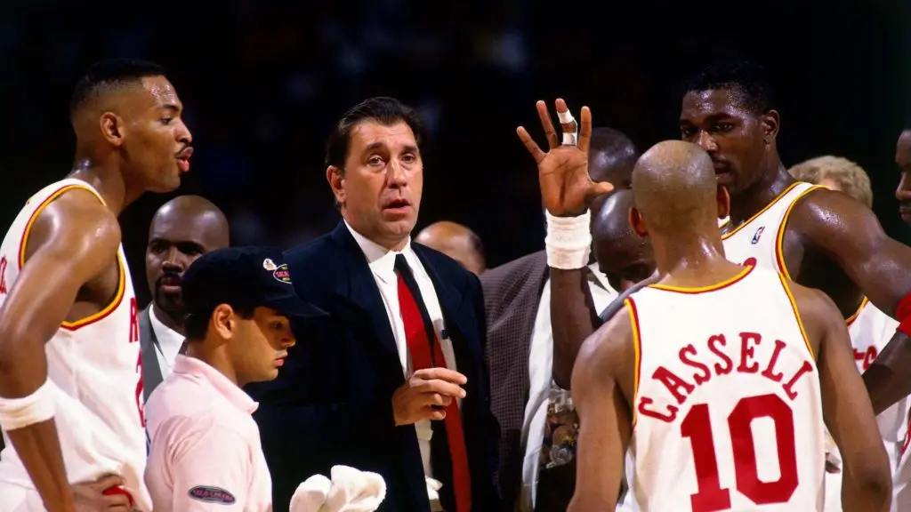 Rudy Tomjanovich is the coach who made the Houston Rockets champions.