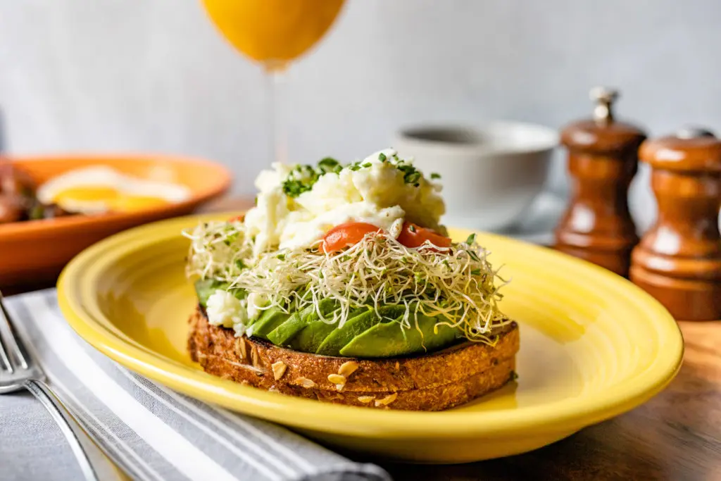 Avocado toast topped with egg whites is among the breakfast offerings at NoPo Café, Market & Bar. (Photo by Kirsten Gilliam)
