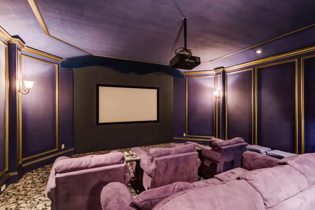 The media room is adjacent to the game room in the 17,313 square foot house. (Photo by TK Images)