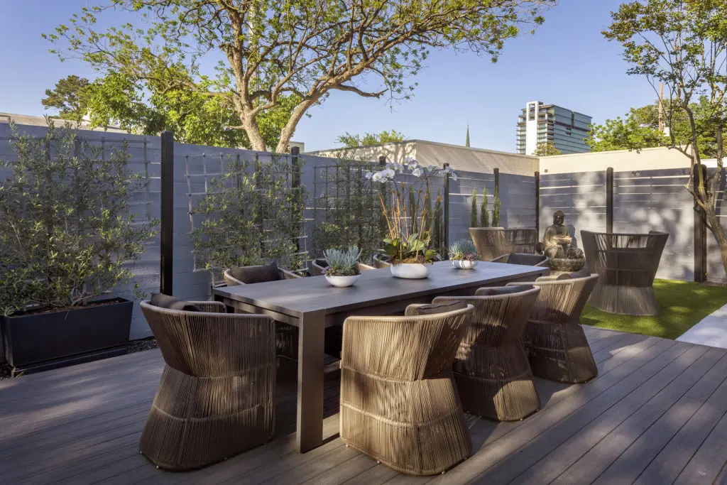 Clients of Therapy Hair Studio, just named number one salon in the nation, have use of the tree-shaded patio adjacent to the salon.