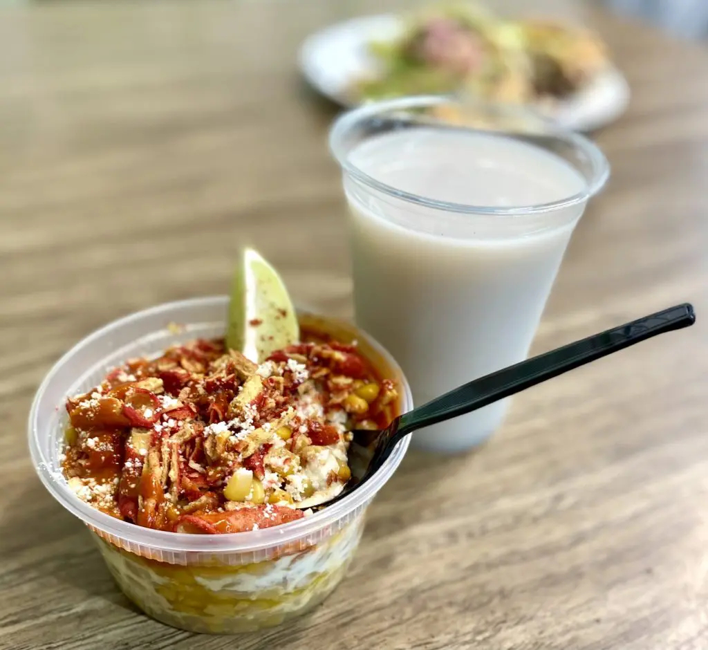 Elote Loco with crushed takis on top.