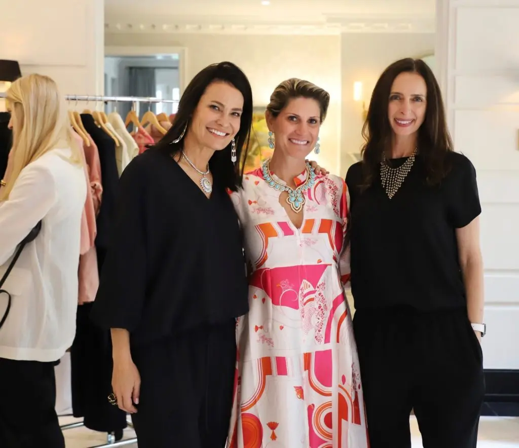 Hosts Francine Ballard and Greggory Burke with designer Max Trowbridge at the multi-tiered trunk show held in Burke's River Oaks home.  (Photo by Lilly Oren)