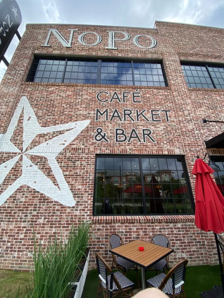 There is no missing the massive NoPo sign on the building at 1244 North Post Oak. 