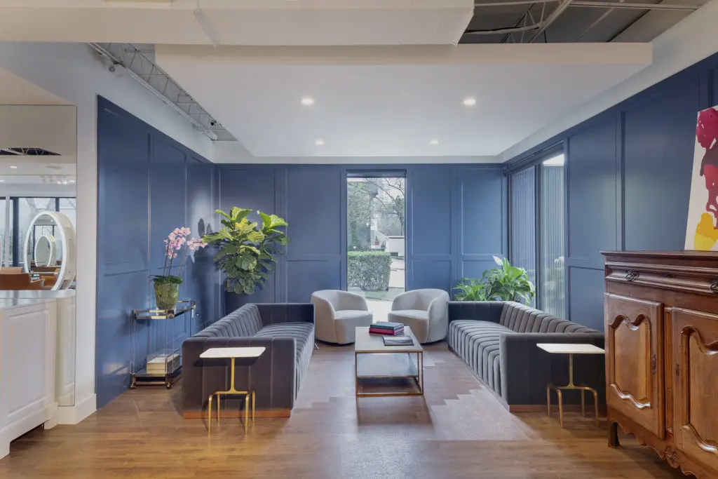 Houston-based designer Kristin Perrin created transformed the original  building into the chic salon.