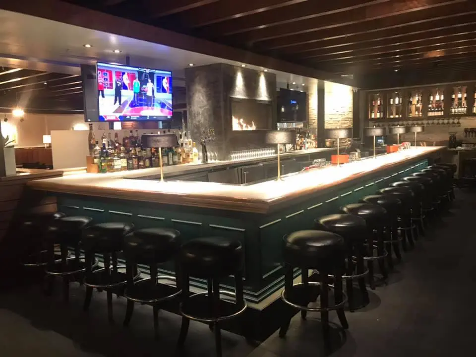 Interior of the new Towne Grill features an oversized L-shaped bar. Photo by 8.10 Construction Solutions. LLC