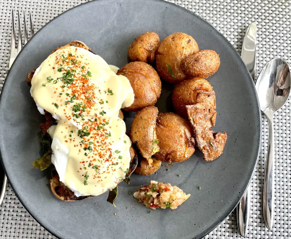 His unique spin on Eggs Benedict speaks with a Southern accent and Berkshire pork belly. (Photo by Courtney Dabney).