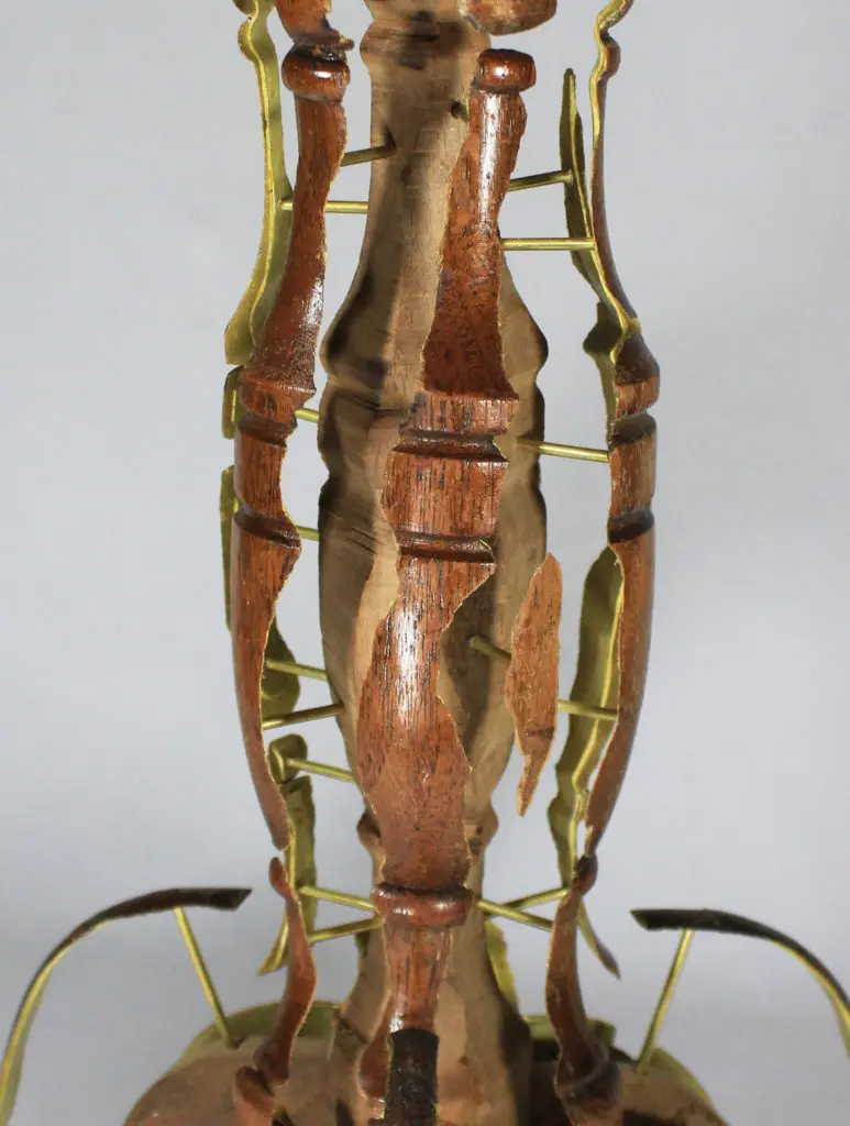 For "Skinned Table," Joyce Lin used a razor blade to lift the veneer, which she mounted on  brass pegs.