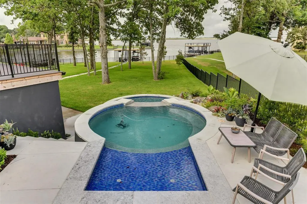 Lounge poolside just steps away from the boat dock. 