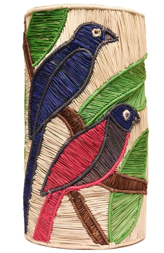 The collection features vases embellished with birds of the island. 