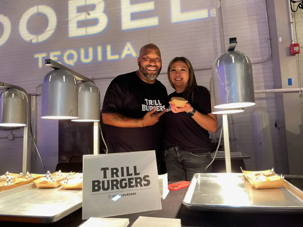 Bun B and Patsy Vivares team up to create delicious smashed burgers. (Photo by Julie Nong)
