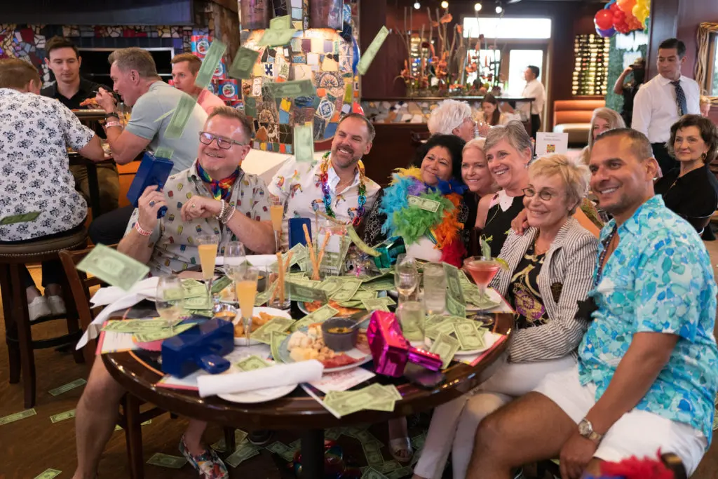 The Mint Julep party crowd rocks at La Griglia as funds are raised for Legacy Community Health. (Photo by Daniel Ortiz)