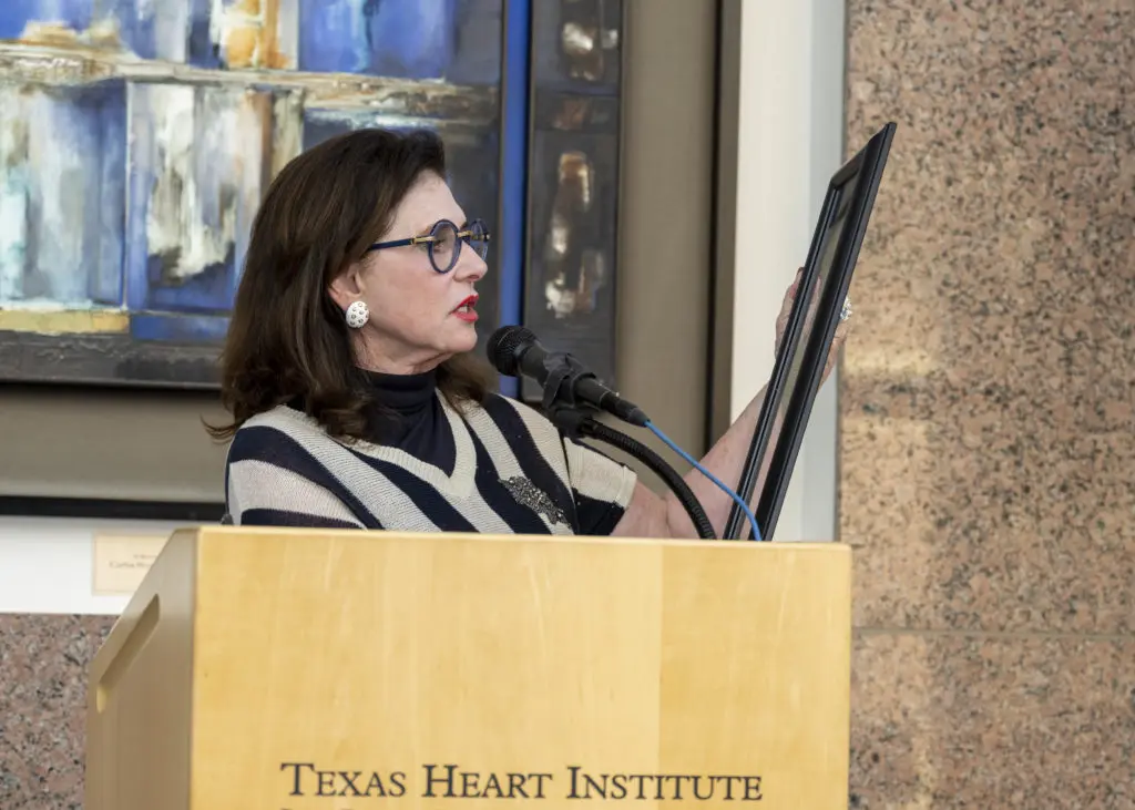 Elyse Lanier presents a City of Houston proclamation at the Texas Heart Institute event honoring Dr. O.H. 'Bud' Frazier. (Photo courtesy of Joe Brewton, THI)