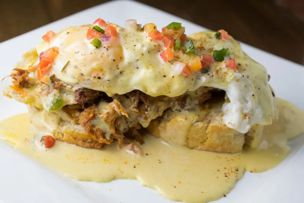 Pork Carnitas Benedict served on Fixture's brunch menu. Photo by Nancy Farrar.