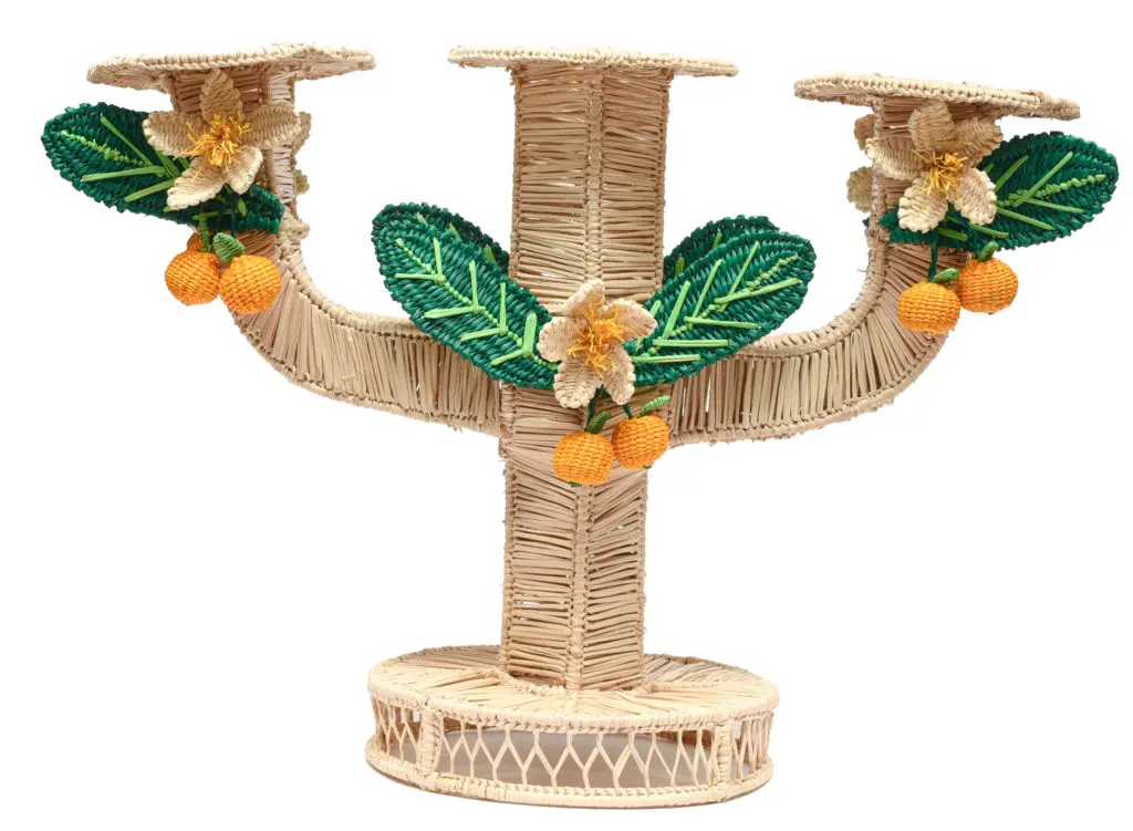 Items like the woven candlesticks evoke the laid back luxury of the island life. 