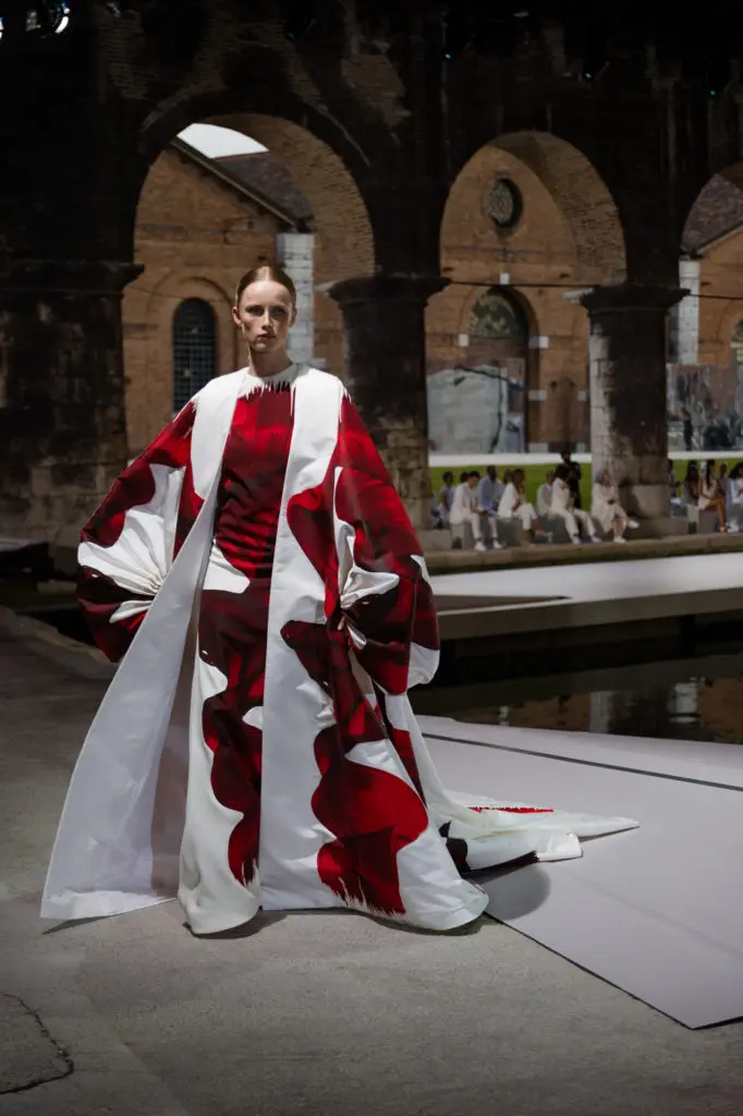 Two large-scale brushstroke paintings by British-born American artist Jamie Nares provided inspiration for this gown and cloak that closed the Valentino Haute Couture Fall 2021 presentation in Venice. (Photo courtesy of Valentino)