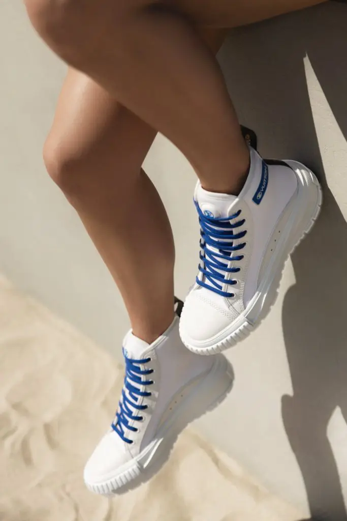 The LV Squad high-top sneaker in canvas and leather with blue laces and blue signature tag (Photo courtesy of Louis Vuitton)