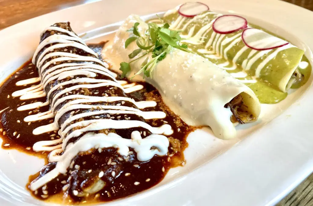 The Enchiladas Tres Colores draped in creamy sauces. Photo by Courtney Dabney.