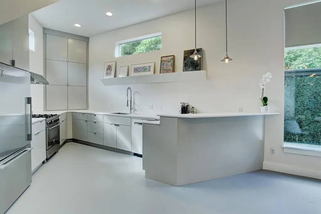 The footprint of the Triangle House in The Heights does little to impair the functionality of the kitchen. 