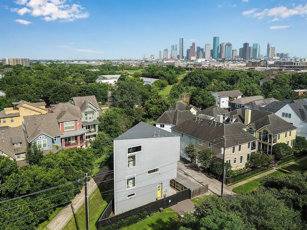 The corner lot of the Triangle House at 530 Oxford Street in The Heights backs up to the hike and bike trail.