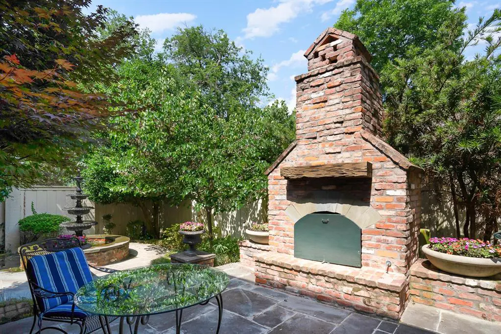 An outdoor fireplace would add a glow to your garden gatherings.  