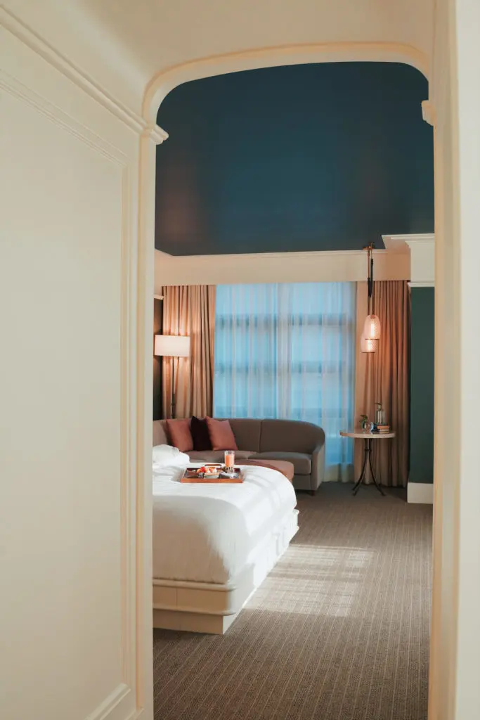 Rooms at Perry Lane Hotel vary from guest rooms to suites and provide luxe bath products.
