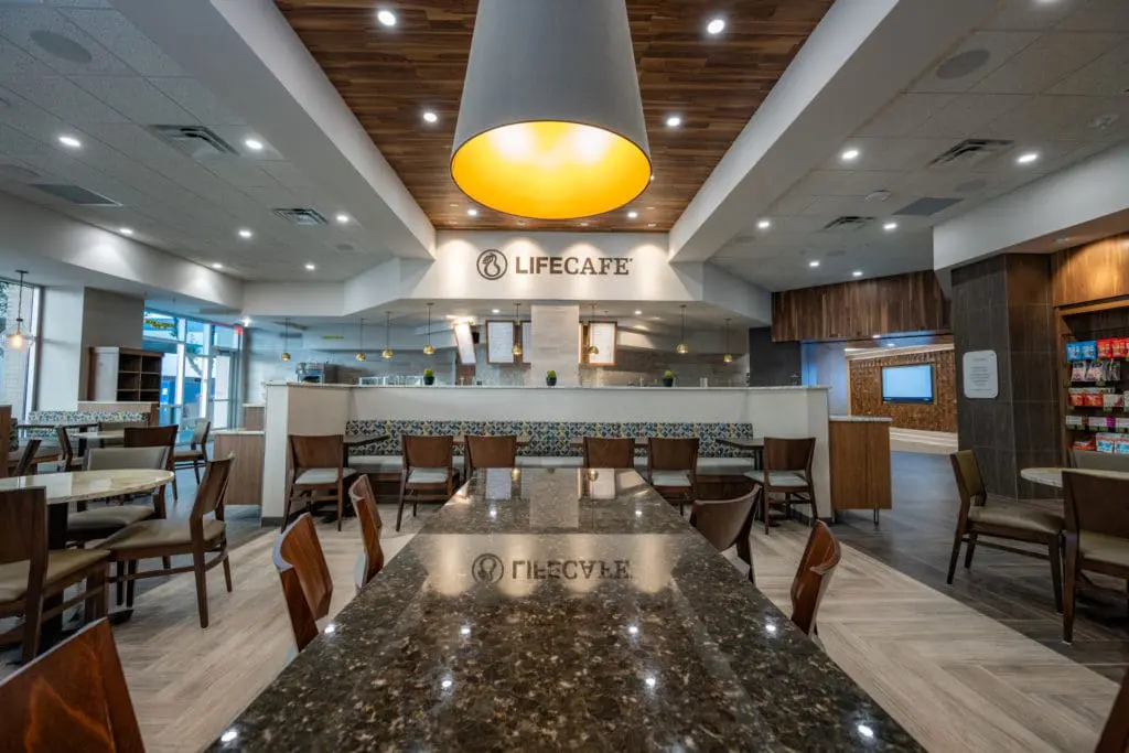 Peering inside Life Cafe inside Life Time Work premium world-class fitness gyms.