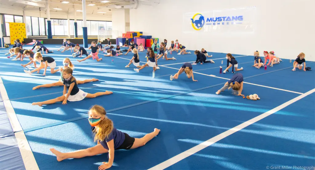 Mustang Cheer is a Dallas cheerleading gym that fosters young athletes and builds self-confidence. (Courtesy of Grant Miller Photography)