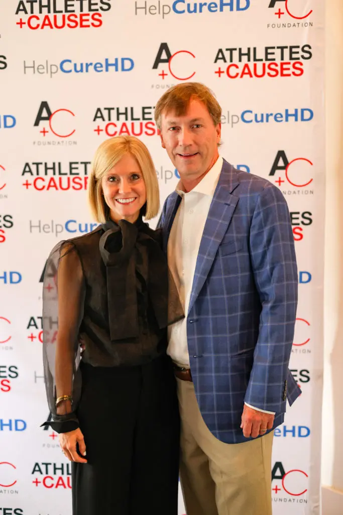 Dr. Erin Furr-Stimming & Chris Stimming at the HelpCureHD fundraiser. (Photo by Kenny Richmond)