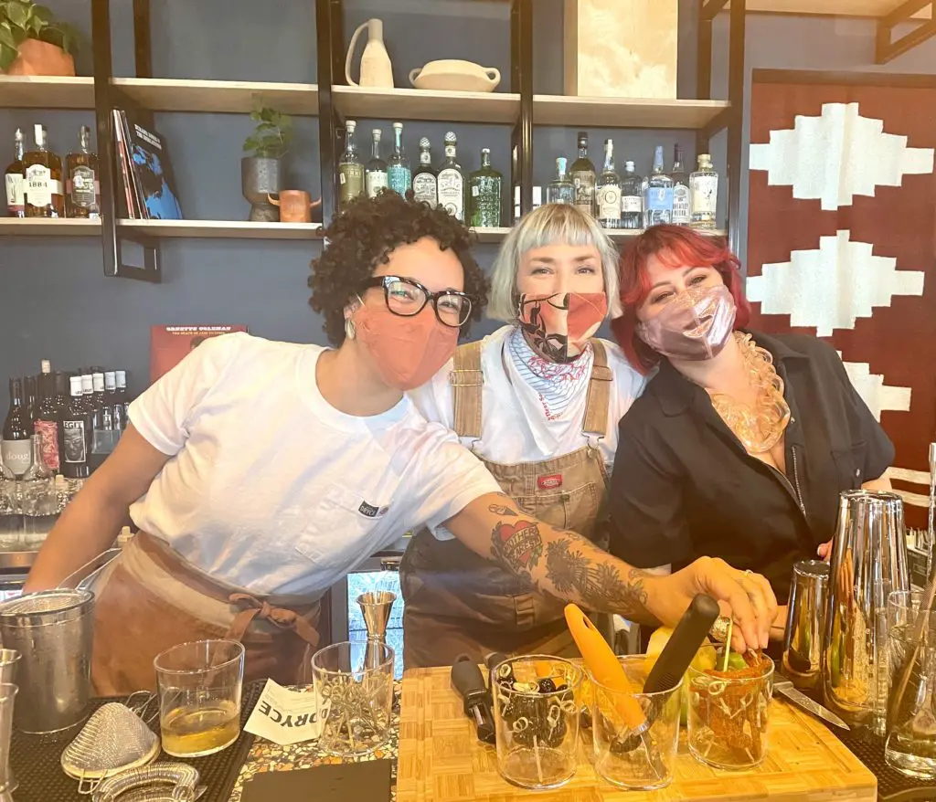 Mixology by Pam Moncrief (center) and patio views make for a big debut at Hotel Dryce. Photo by Courtney Dabney.