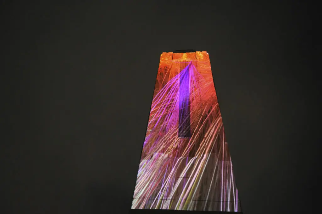 Refik Anadol's massive artwork, Pioneer Tower Dreams, will be projected onto Pioneer Tower.