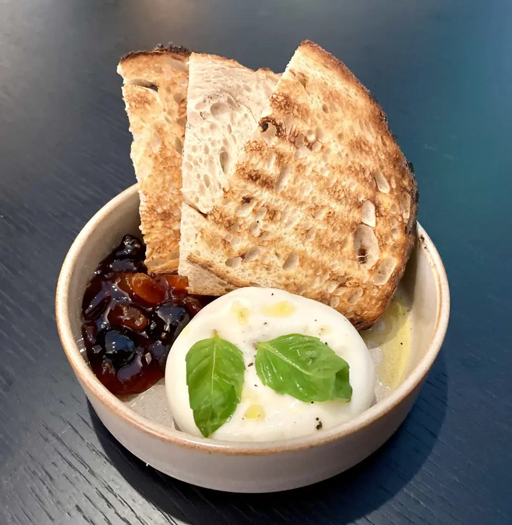 Il Modo's fresh burrata with cherry apricot mostarda. (Photo by Courtney Dabney)