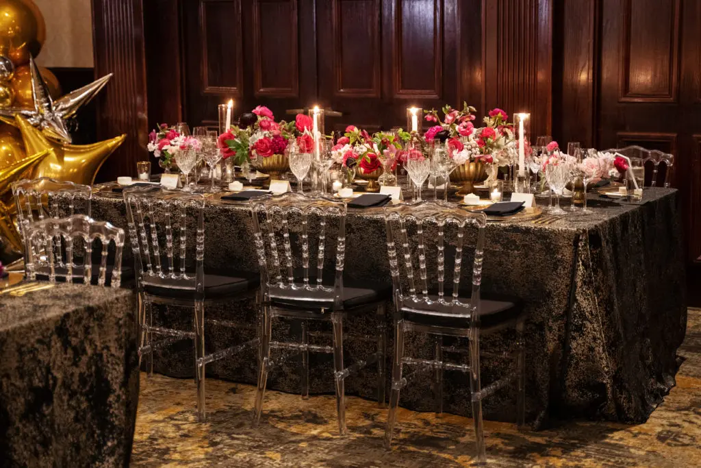 Sixty and Stunning sets a dramatic table. Designed by Allison Speese. Photography by Perez Wedding Photography.