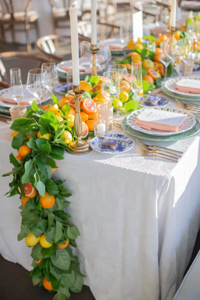 Positively Positano party with Lucca matte gold and silver flatware, extreme Riedel stemware, and Denmark chairs. Photo by Kiss Me for Eternity Photography. Planning and design by Jackson Durham Events. 