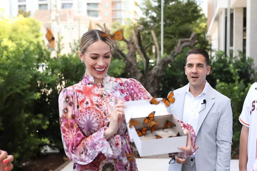 Daniella Correa releases butterflies  at MAD in River Oaks District as part of the Fabergè/Correa Family Foundation benefit luncheon. (Photo by Quy Tran)