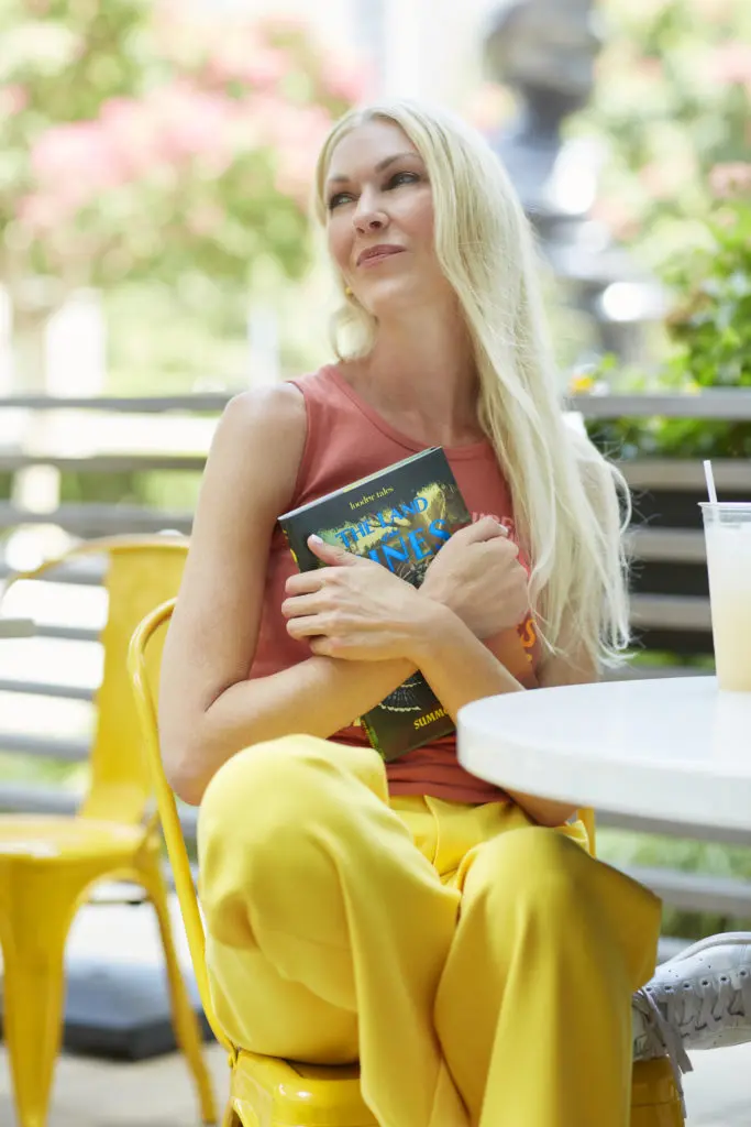 Dallas' Summer Nilsson with the first book in her Loodor Tales series, "The Land of the Pines." 