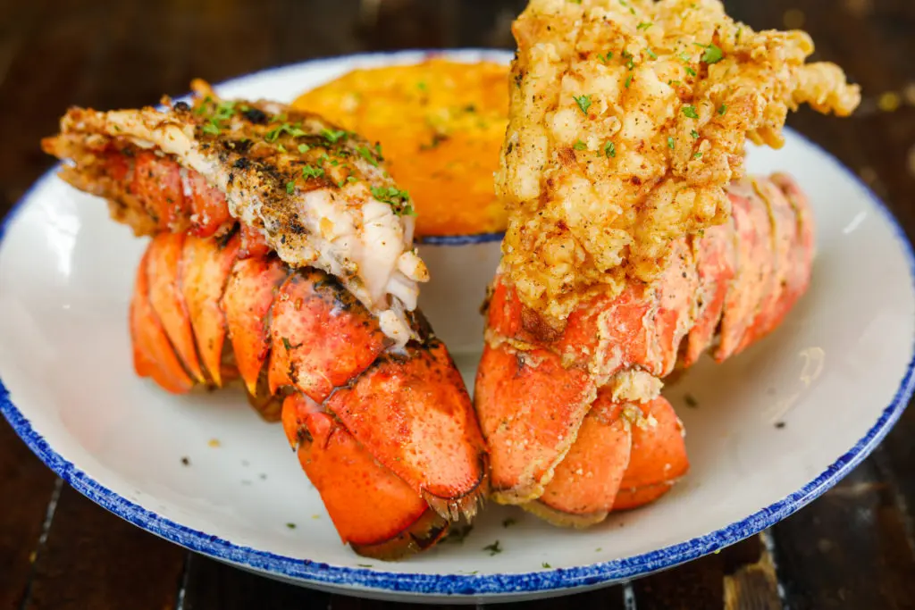 The fried lobster at Taste Bar + Kitchen, served with waffles or grits, has fans standing in line for up to three hours for a sampling of Chef Don Bowie's cuisine. (Photo by Jeremiah Jones)